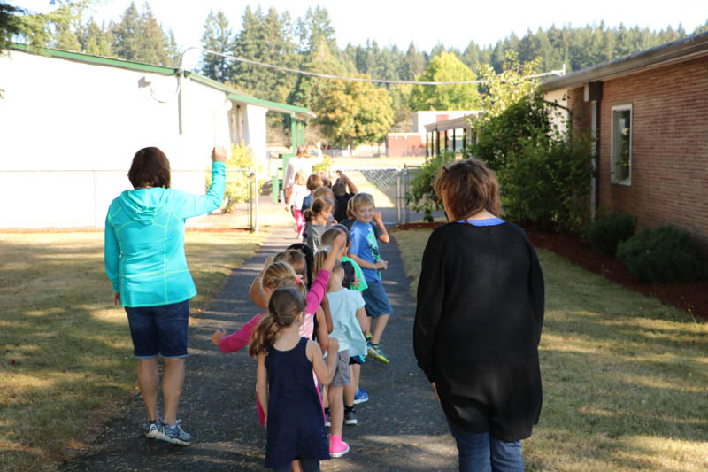 Students at Glenwood Heights Primary School learn the behavior expectations as they walk across campus. Photo courtesy of Battle Ground Public Schools