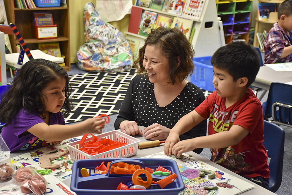 Vancouver Public Schools preschool teacher Kendra Yamamoto, pictured here with a few of her students, is the region’s ‘Teacher of the Year,’ and was one of nine finalists for the Washington State Teacher of the Year award. Photo courtesy of Educational SD 112