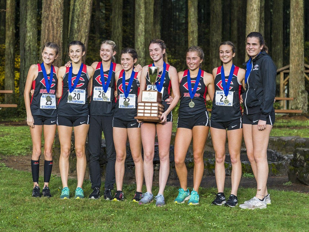 The Camas Papermakers won their fifth straight Greater St. Helens League Class 4A girls cross country title Thursday and will continue in their quest to claim their fifth state title in the past six years. Photo by Mike Schultz