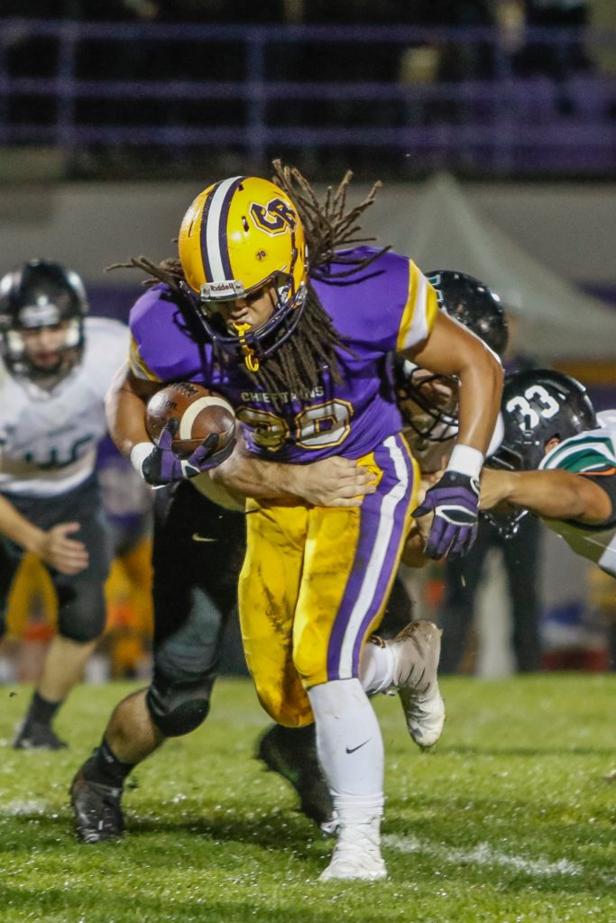 Columbia River running back Hunter Pearson (30) runs for a touchdown against Woodland Friday. Photo by Mike Schultz.