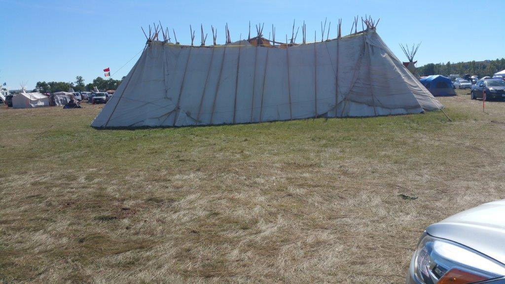 Inside this lodge, at the main camp of the Dakota Access Pipeline resistance, headed by the Standing Rock Sioux Tribe, the seven council fires of Sioux gathered for the first time in nearly 130 years. Photo courtesy of Melody Pfeifer, Cowlitz Indian Tribe
