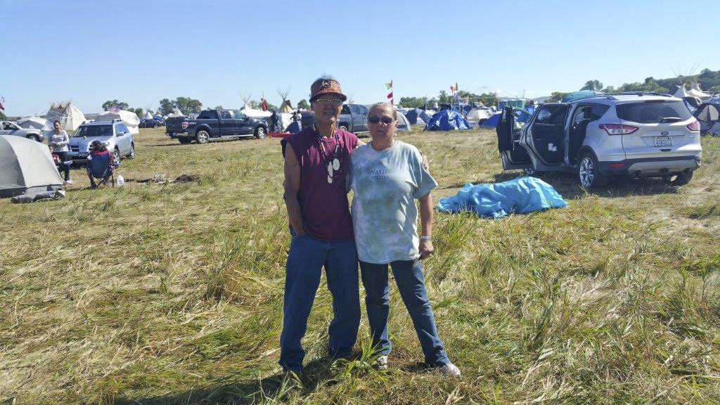 Linda O’Brien, a member of the Cherokee-Shawnee tribe and wife of Cowlitz Indian Tribe councilman John O’Brien (not pictured) stands with Joseph Komok, an Alaskan Inuit, at the resistance of the Dakota Access Pipeline in North Dakota, in early September. Photo courtesy of Melody Pfeifer, Cowlitz Indian Tribe