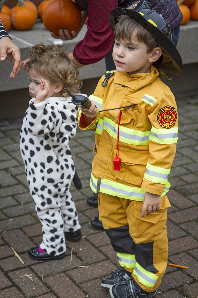 Every fireman (Caden Smith) deserves his own Dalmatian (Harper Smith), or at least it appeared that way Wednesday at the Downtown Washougal Pumpkin Harvest Festival. Photo by Mike Schultz