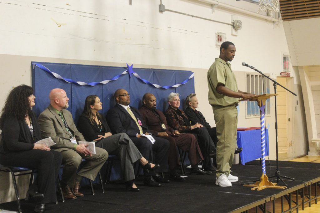 Several different inmates gave speeches on behalf of their different classes who were graduating from the Thinking for a Change program on Oct. 13 at Larch Corrections Center. Mario Clark gave the first speech, introducing his class, Class 21. Photo by Joanna Yorke