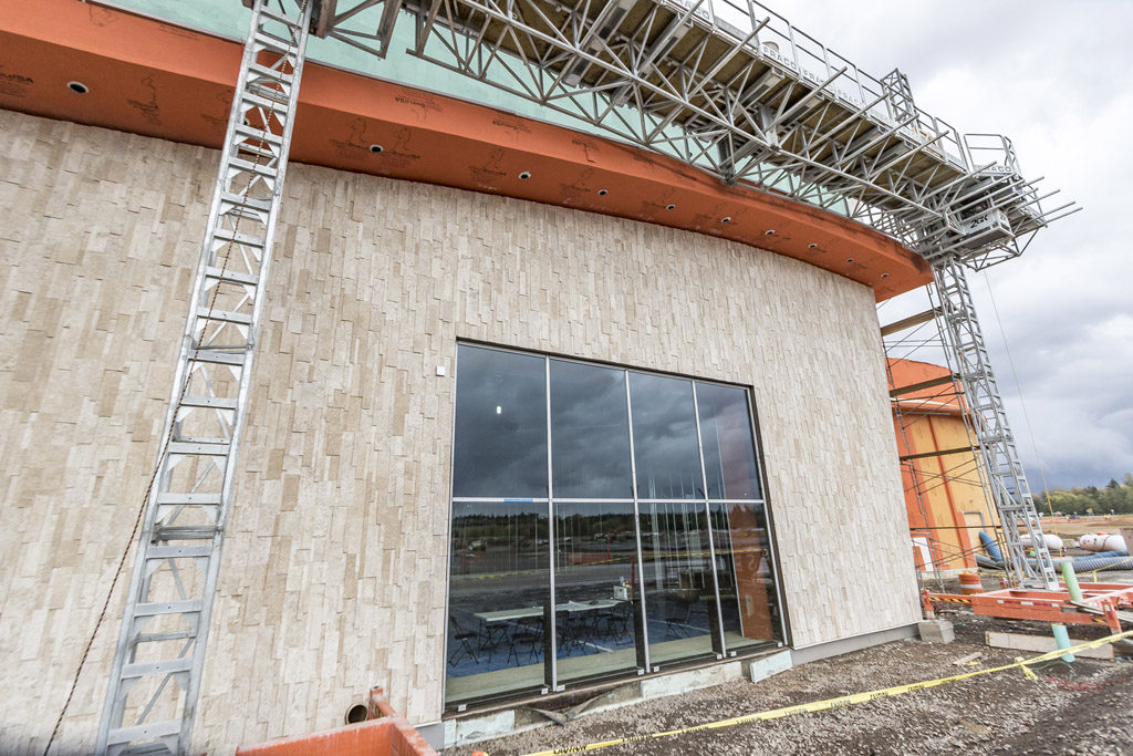 With its floor-to-ceiling windows and outdoor dining spaces, the new ilani casino-resort being built on the Cowlitz Indian Reservation near La Center will take full advantage of the reservation’s mountain views and provide a more natural feeling for guests inside the massive casino-resort, which boasts 15 restaurants, retail shops and bars, two entertainment venues and convention center. Photo by Mike Schultz