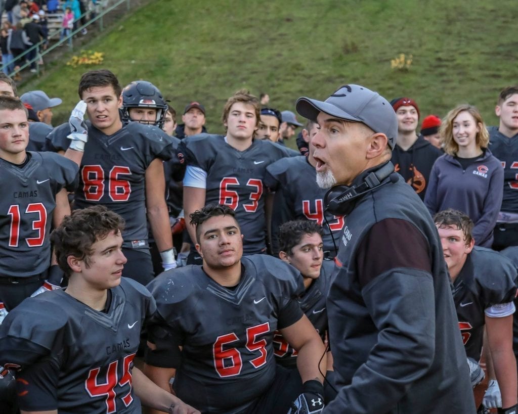 Camas head coach Jon Eagle speaks to the palyers after a victory over Sumner. Photo by Mike Schultz