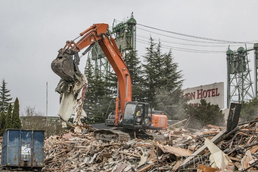 Demolition crews reduce much of the iconic Red Lion at the Quay hotel, which closed in 2015 after more than 50 years in business along Vancouver’s Columbia River waterfront, to a pile of rubble on Fri., March 17. Photo by Mike Schultz