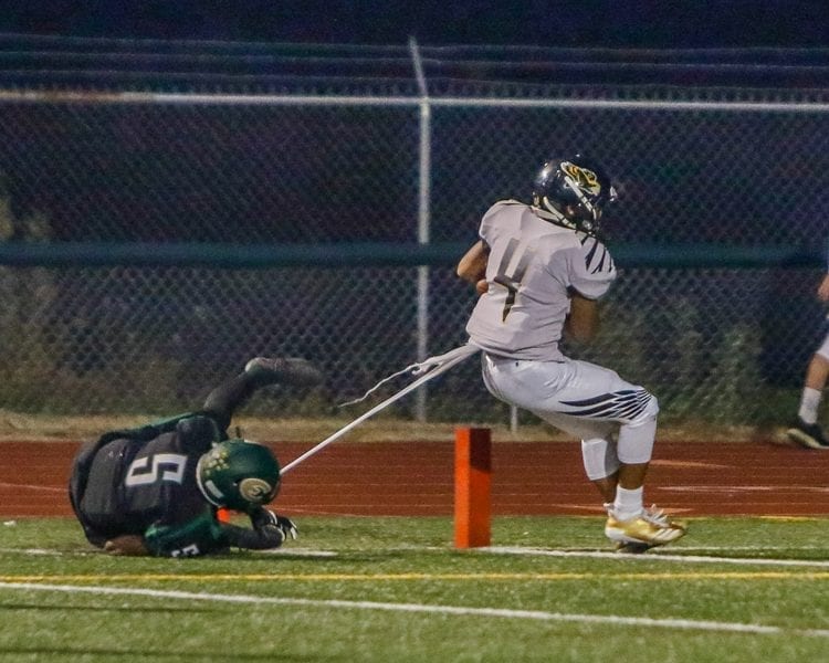 Quadrese Teague (4), shown here scoring a touchdown in a game earlier this season with Evergreen, scored two touchdowns on kickoff returns in last week’s game with Mountain View. Photo by Mike Schultz