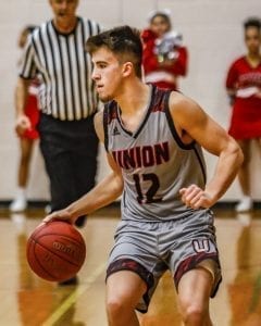 Union guard Tyler Combs (12) is averaging 18 points a game to lead the Titans to a 9-3 record so far this season. Photo by Mike Schultz