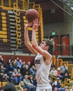 Prairie senior Braiden Broadbent, shown here in a game last season, was a second team all-league performer as a junior for the Falcons. This season, he has helped Prairie win six of its last seven games, including a victory over Kamiakin in which Broadbent made the key bucket. Photo by Mike Schultz