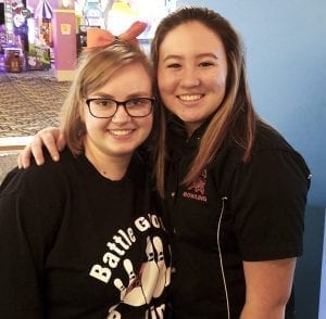 Takara Suhama (right) and Battle Ground teammate Darian Dyer shared quite a moment Friday at the Class 4A district bowling championships. They both tied with a 519 series. Suhama was declared the district champion via tiebreaker. Both will be going to state next week. Photo by Paul Valencia