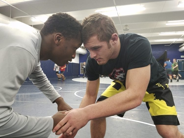 Jackson McKinney (right) said he feels at home on any wrestling mat. Here he is training with Skyview teammate Tiajaie Allen. Skyview is hosting the Clark County Wrestling Tournament this week. Photo by Paul Valencia