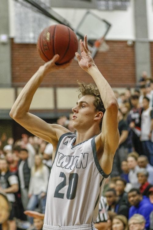 Quinn Lamey (20) nailed a big 3-pointer toward the end of the third quarter, capping a Union rally to take the lead. But it was his defense in the second half that was most impressive, helping the Titans to a win over Skyview. Photo by Mike Schultz