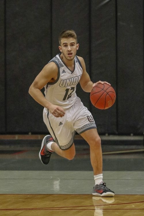 Tyler Combs (12) scored 10 of his team-high 18 points in the second half as Union rallied from a 12-point deficit Tuesday night to hand Skyview its first loss of the season. Skyview and Union each have one league loss now. Photo by Mike Schultz