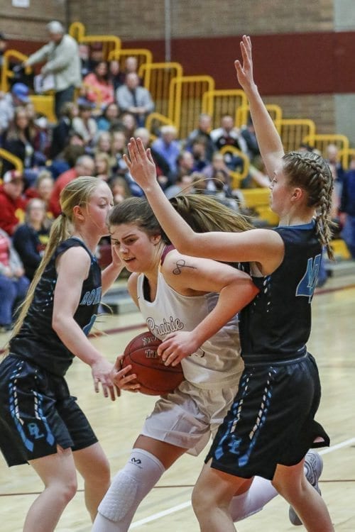 Mallory Williams (13) gets aggressive inside against Bonney Lake. Williams scored eight points to go with five rebounds and three steals in the win. Photo by Mike Schultz