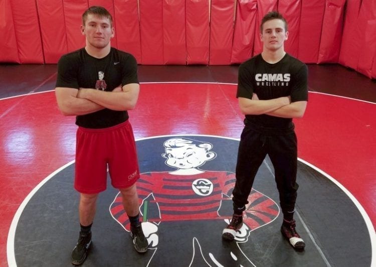 Samuel and Gideon Malychewski were two of four Papermakers to win region championships Saturday in Pasco. Camas qualified a total of seven wrestlers to this week’s Mat Classic in the Tacoma Dome. Photo by Paul Valencia