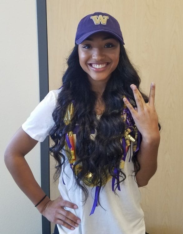 Union soccer standout MaKayla Woods gives the W sign after she signed with the University of Washington. Photo by Paul Valencia