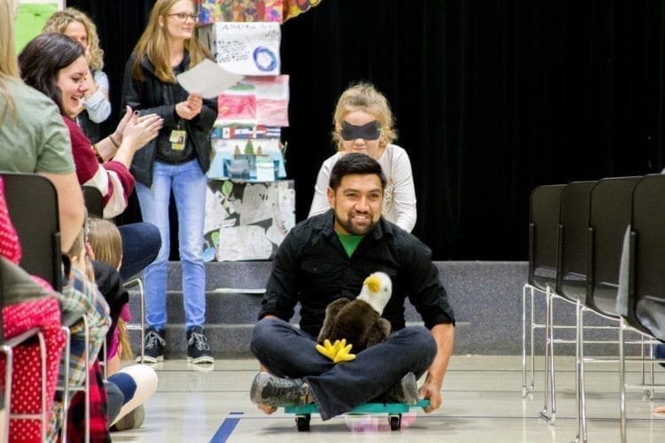 The assemblies at Woodland Intermediate School feature team competitions like January's with a race where a blindfolded student had to push a teacher across the gym guided by only the teacher's vocal directions. Photo courtesy of Woodland School District