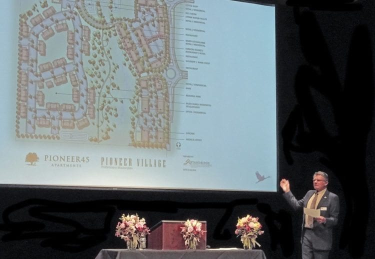 Ridgefield Mayor Ron Onslow talks about the Pioneer Village development, where Ridgefield’s new Rosauers grocery store will be built. Photo courtesy of Rick Browne