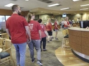 Evergreen school teachers marched into a Columbia Credit Union managed by school board Director Julie Bocanegra on Tuesday, to tell her Superintendent John Steach wasn’t bargaining in good faith. Photo courtesy Evergreen Education Association