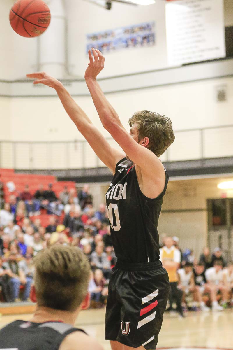 Mason Hill went off Tuesday night, making six 3-pointers, including four in the fourth quarter, helping the Union Titans rally to a win over Battle Ground. Photo by Mike Schultz