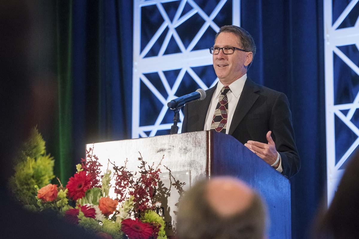 Kevin Ryan takes the podium after accepting a 2019 Lifetime of Giving Award on behalf of his family. Photo courtesy of Community Foundation for Southwest Washington