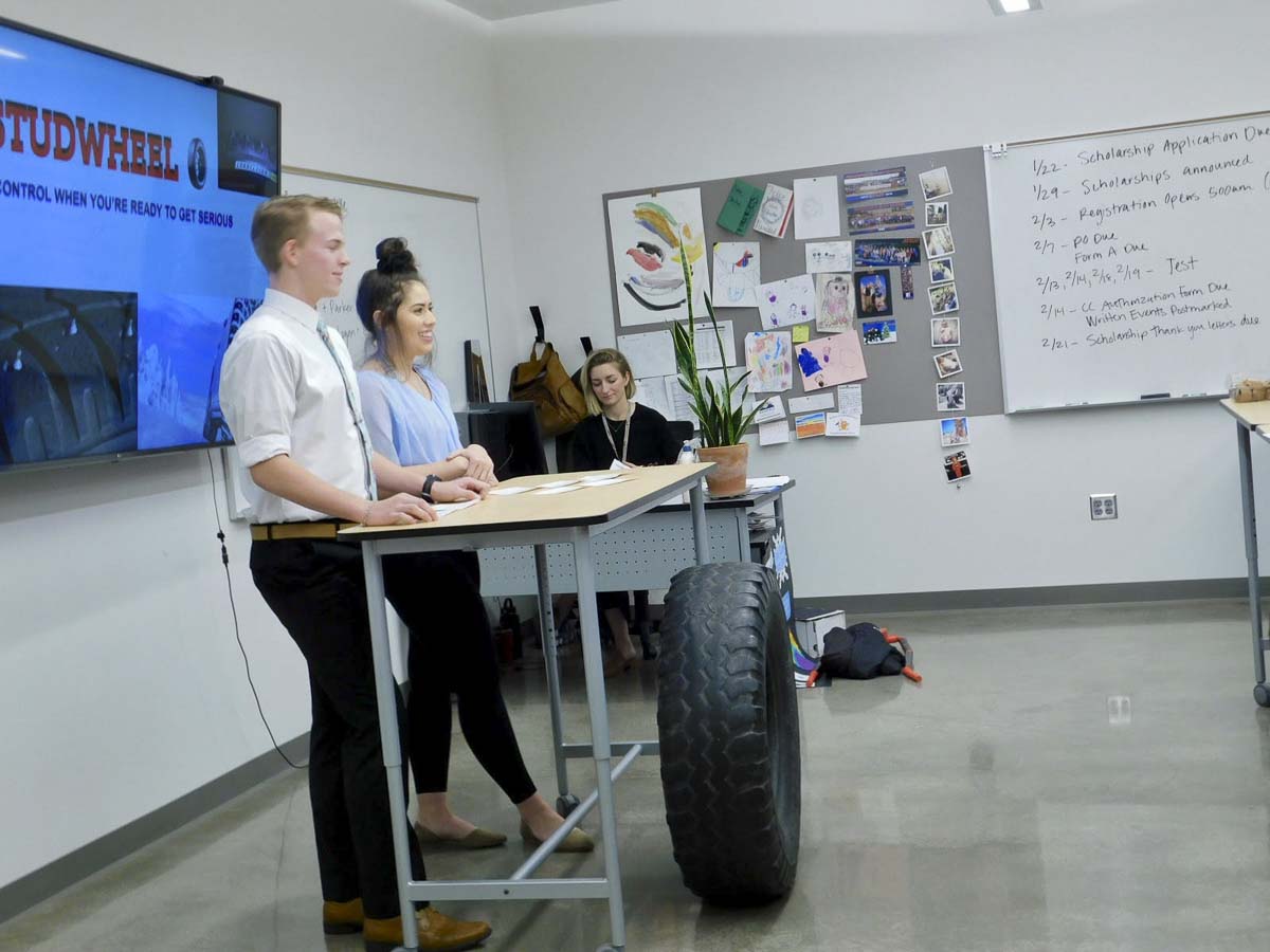 Ridgefield High School students Elijah Engstrom and Leilani Starns pitch their concept to the Shark Tank panel for tires with retractable studs. Photo courtesy of Ridgefield Public Schools