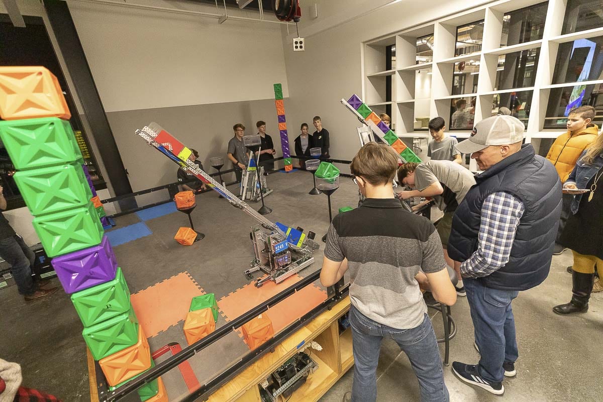 iTech Prep students are seen here demonstrating their robotics project to parents and community members at the iTech dedication this week. Photo by Mike Schultz