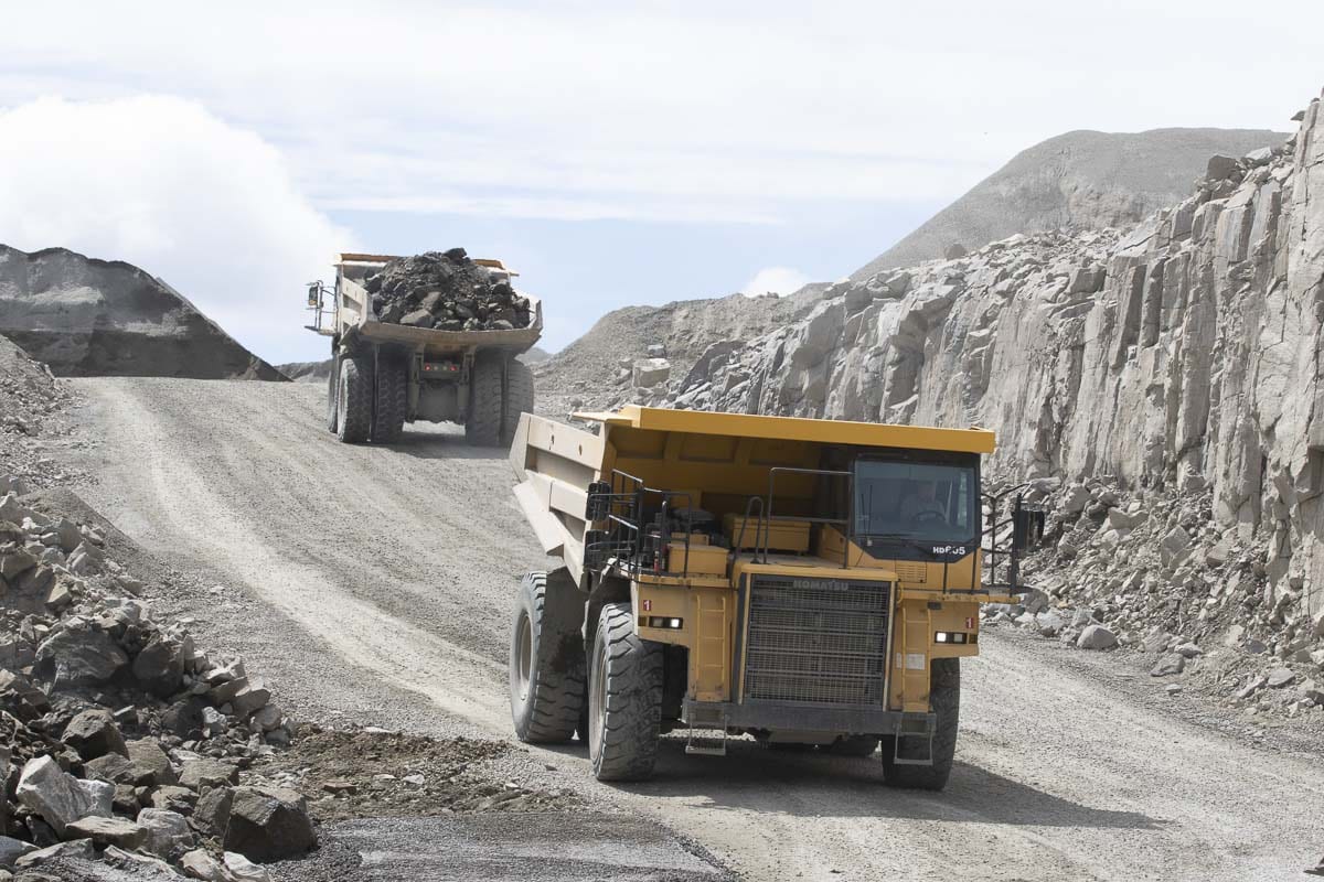 Dump trucks at the Yacolt Mountain Quarry move raw aggregate out of the main pit and to the crusher for processing. Photo by Mike Schultz