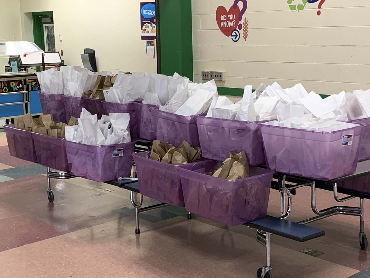 Woodland Public Schools staff packed and delivered nearly 800 bags with breakfast and lunch. Photo courtesy of Woodland Public Schools