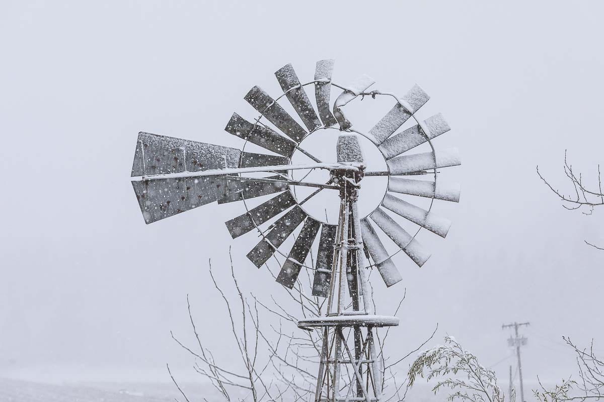 Snow covers a windmill near Fargher Lake in north Clark County on Saturday morning. Photo by Mike Schultz