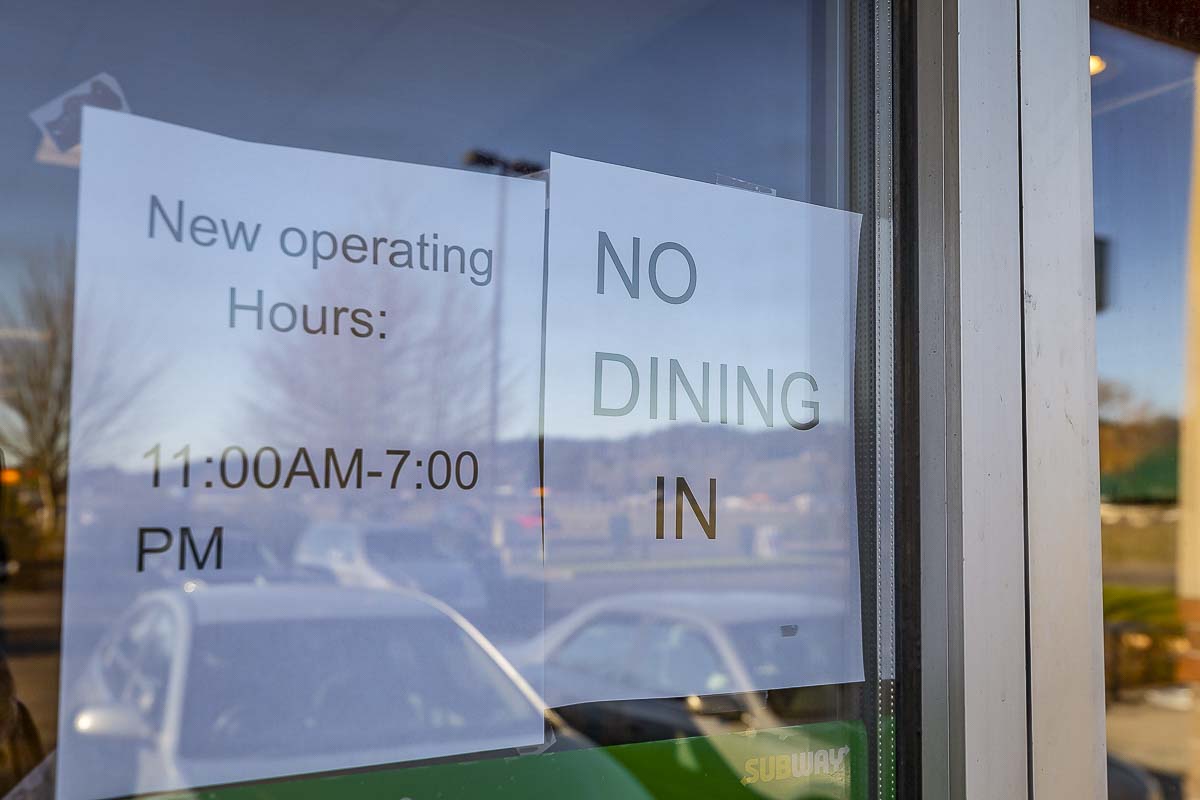 This sign in the window of a Woodland Subway restaurant is similar to many all over Clark County in the midst of a viral pandemic. Photo by Mike Schultz