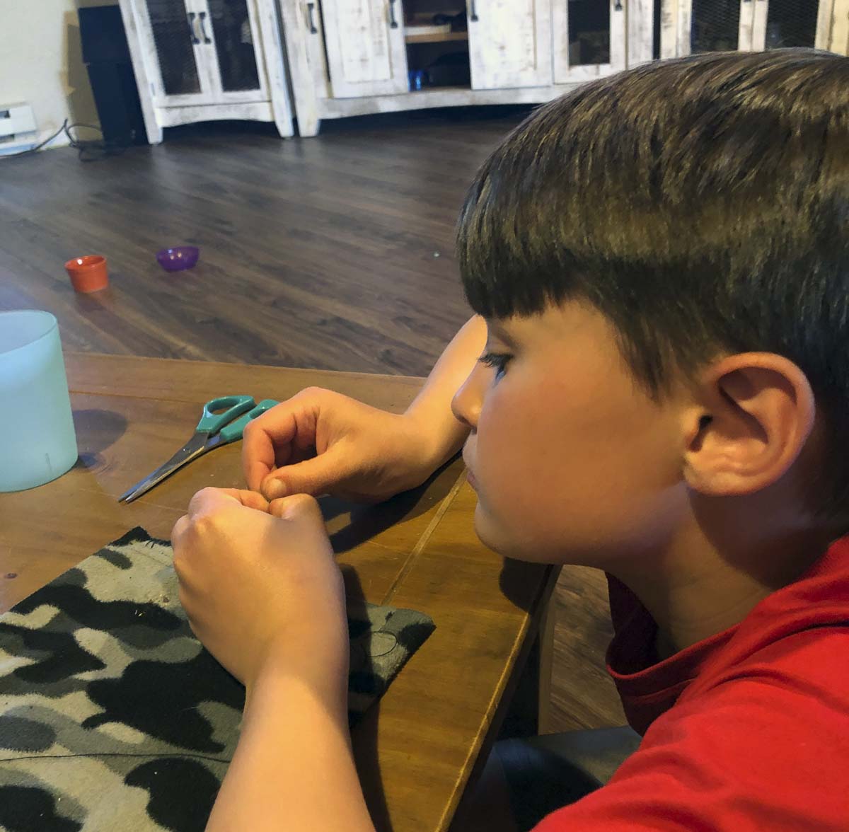 Logan Gnade, a 4th grader at North Fork Elementary School, used math and sewing to design patterns and sew face masks for friends and family. Photo courtesy of Woodland Public Schools