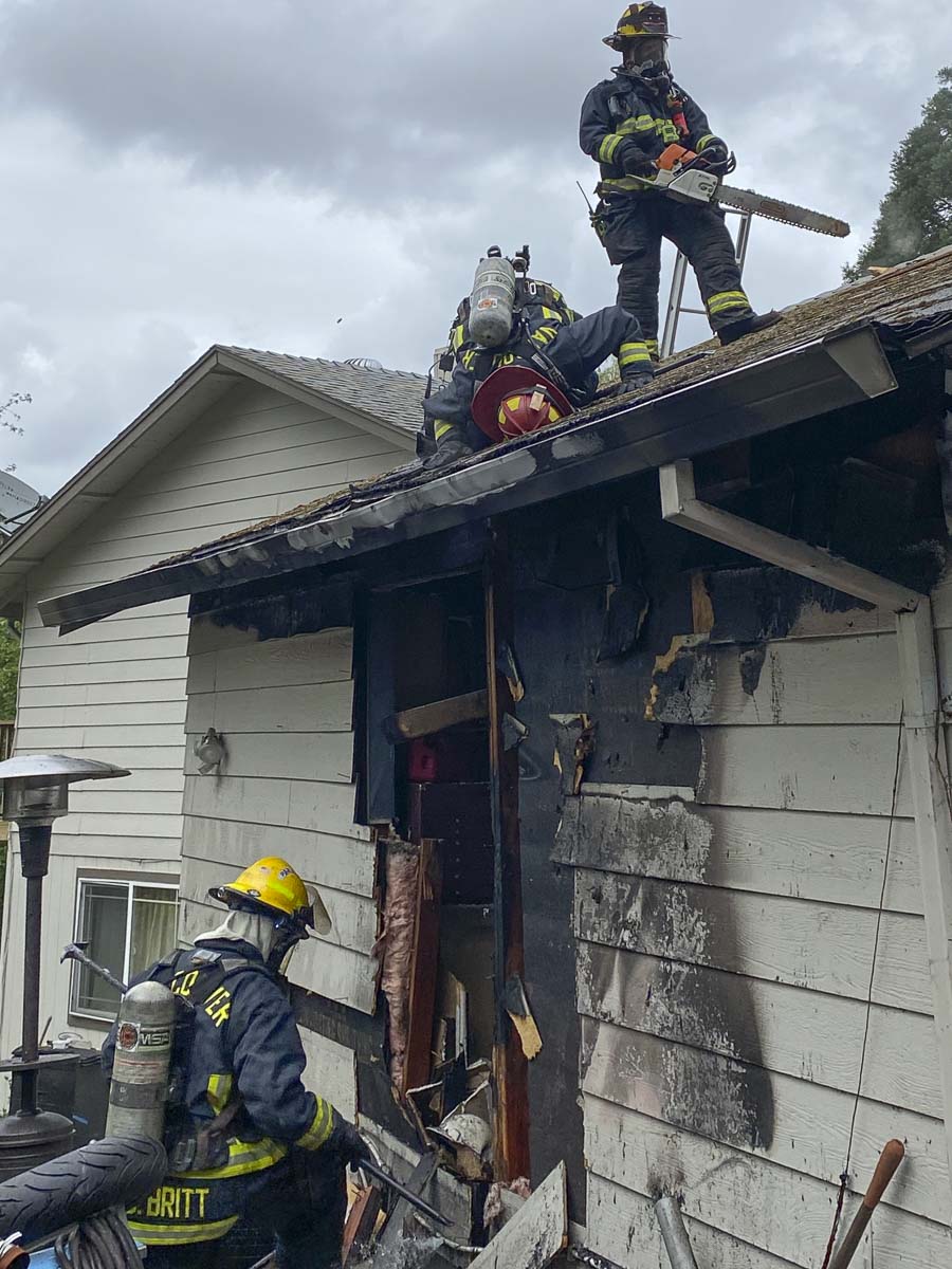Crews from the Vancouver Fire Department successfully extinguished a garage fire Monday afternoon at a residence in Vancouver. Photo courtesy of Vancouver Fire Department