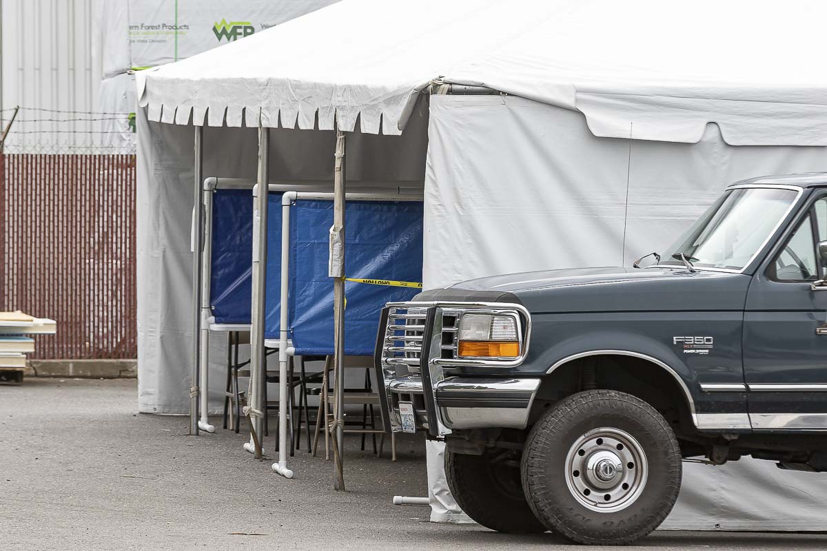 Firestone Pacific Foods in Vancouver has set up a tent outside with barriers where employees can eat lunch in an attempt to stop an outbreak of COVID-19 that has impacted at least 69 workers at the frozen fruit packing plant. Photo by Mike Schultz