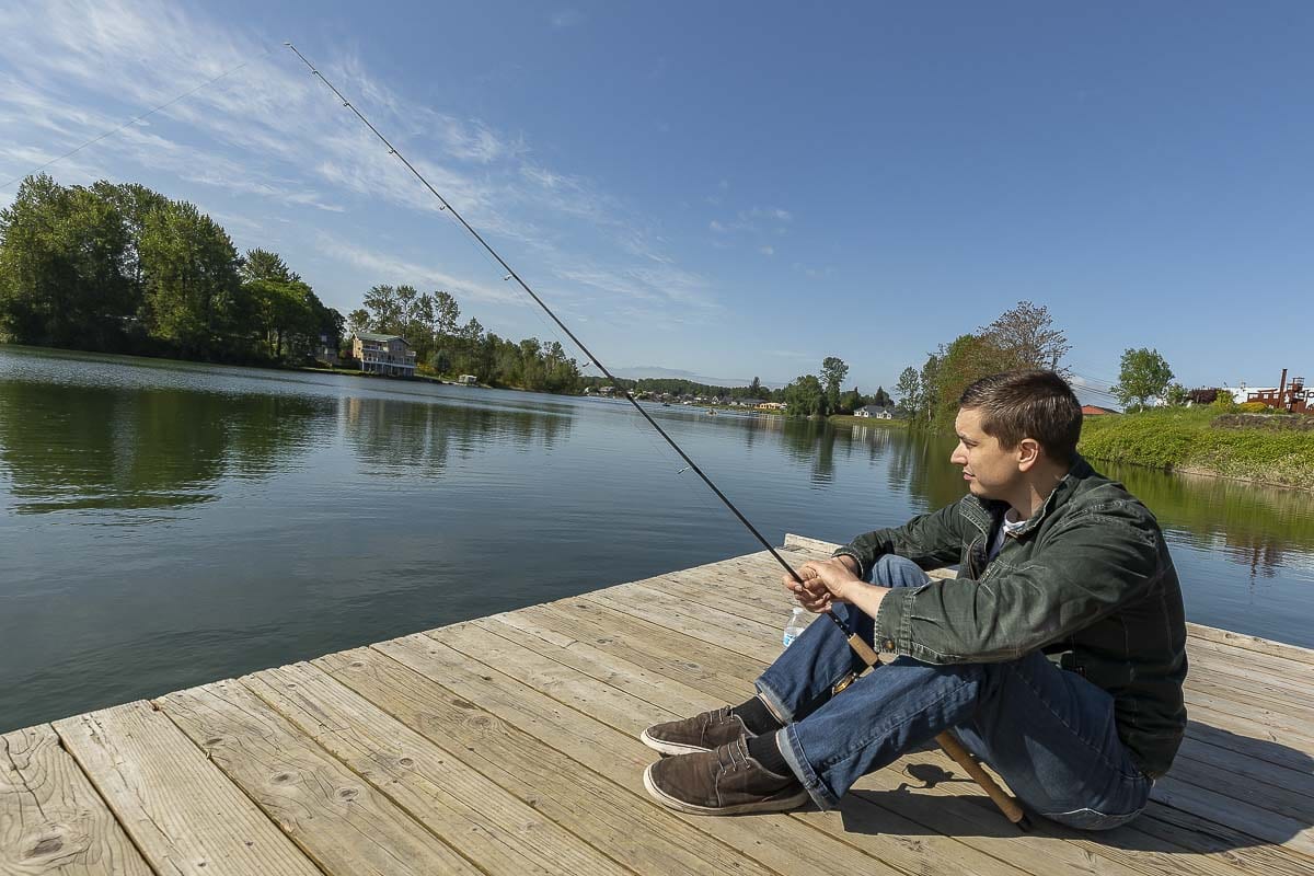 Lucas Holmgren was among the local anglers who made it to Horseshoe Lake in Woodland for Tuesday’s reopening of recreational fishing. Photo by Mike Schultz