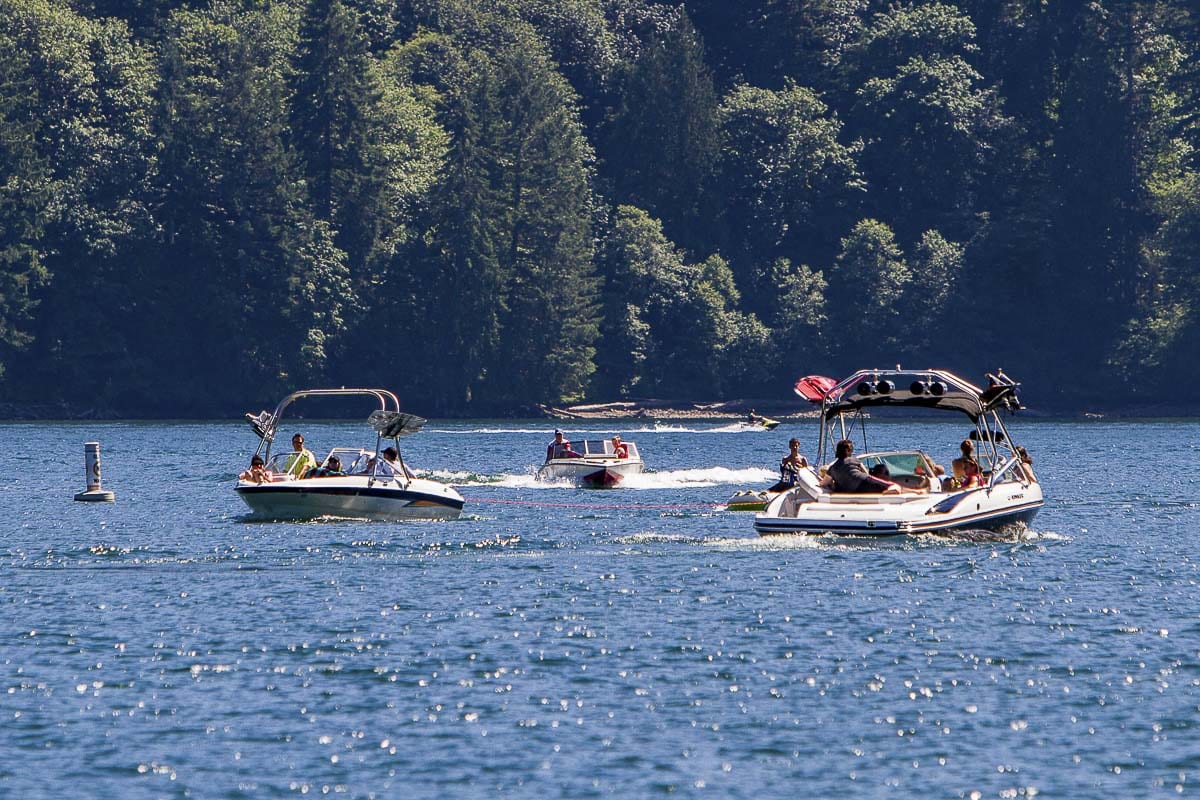 Public Health officials encourage everyone to follow a few simple strategies to stay safe while enjoying the water now and throughout the summer. In this file photo, area residents enjoy a sunny day on Lake Merwin. Photo by Mike Schultz