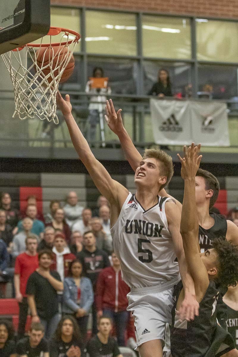 Union’s Tanner Toolson will put basketball on hold for a couple of years while he goes on a mission for his church. When he returns to the game, he will play for Brigham Young University. Photo by Mike Schultz