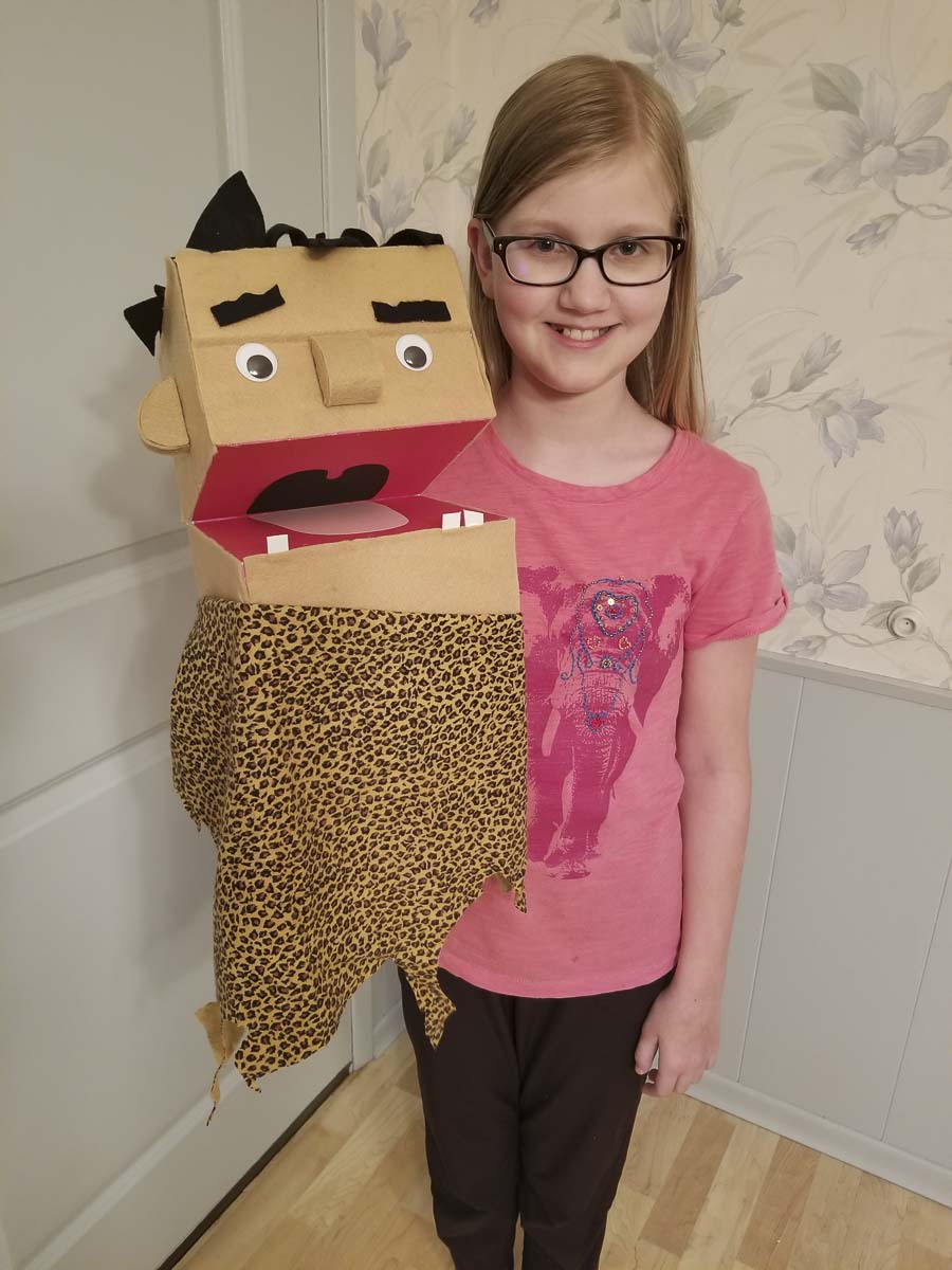 Young Lucy shows off her puppet as part of one of Journey Theater’s online classes. Photo courtesy of Journey Theater