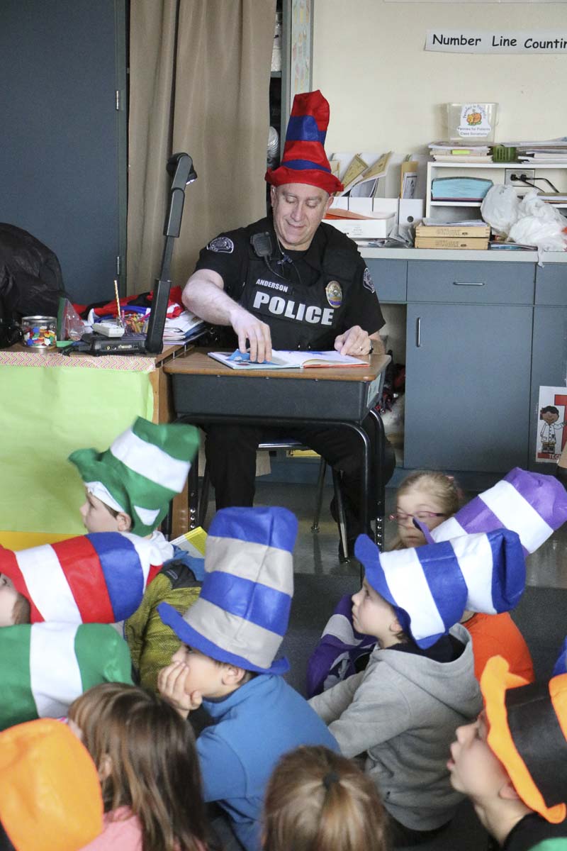 BGPS SRO Phil Anderson reads Dr. Suess books to students as part of Read Across America Day in March, 2018. Photo courtesy Battle Ground Public Schools