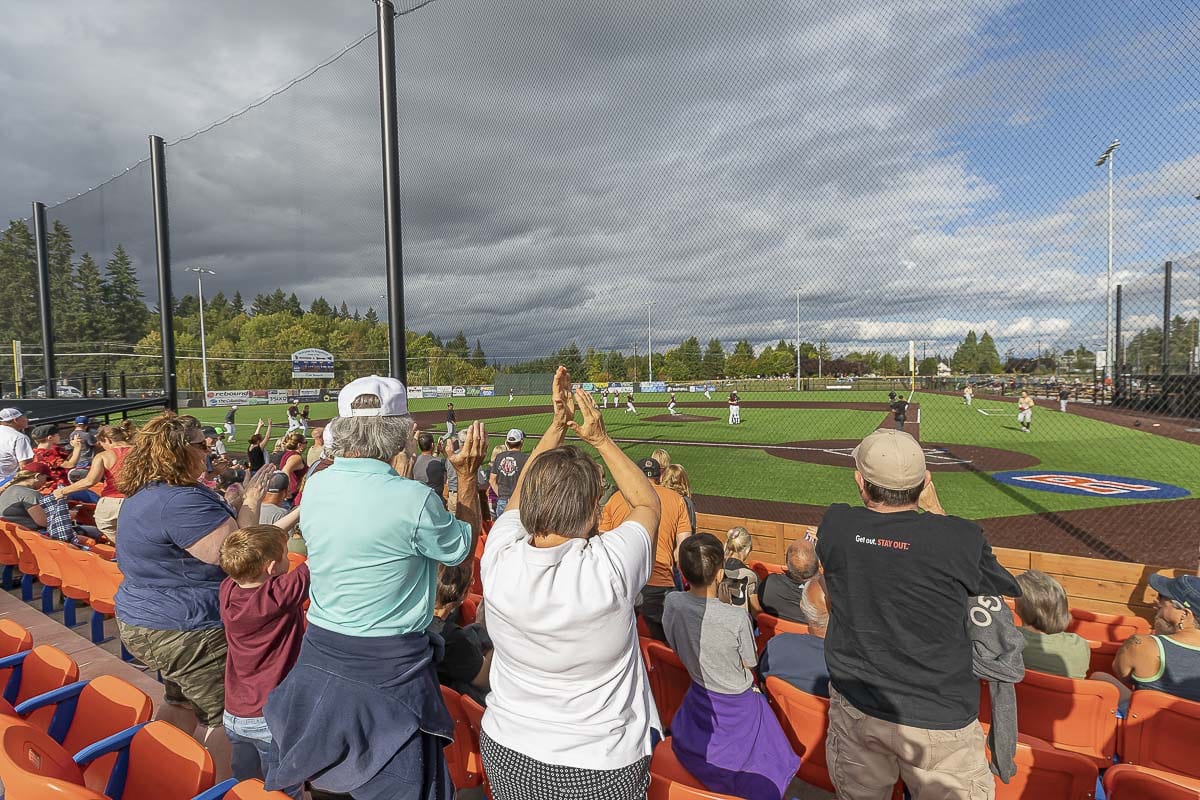 Fans cheer the final out of the 2019 Ridgefield Raptors baseball season last August. That will be the final play until the 2021 campaign. The Raptors cancelled this summer’s season. Photo by Mike Schultz