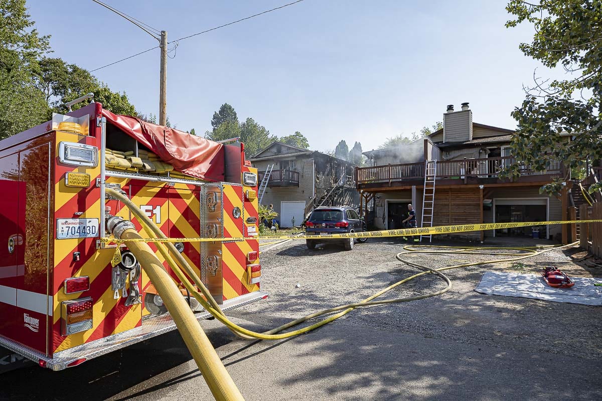 Just after 9 a.m. Friday, Vancouver Fire Department crews were dispatched to the report of a fire at a pair of duplexes in the 3600 block of Olive Street. Photo by Mike Schultz