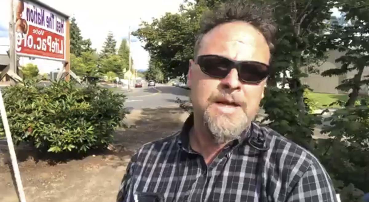 Rob Anderson speaks during a Facebook livestream of a protest outside the Clark County Public Health building. Screenshot from People’s Rights Washington Facebook livestream