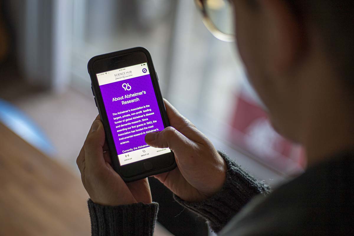 The Alzheimer’s Association recently launched their science hub app for Android and iOS, which fact-checks Alzheimer’s science and provides up-to-date info on disease research. Photo illustration by Bailey Granneman
