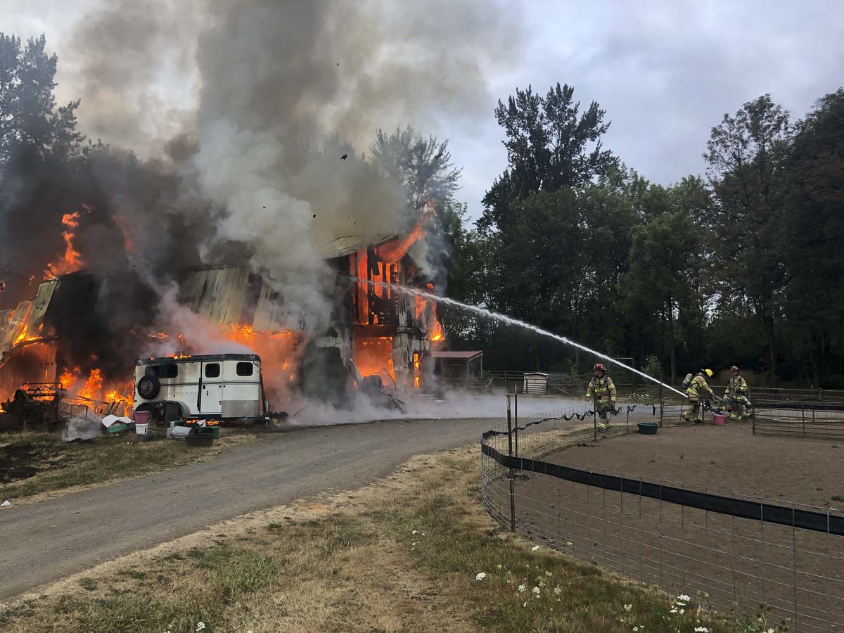 Firefighters are shown here flowing water from the outside to control the fire. Photo courtesy of Clark County Fire & Rescue