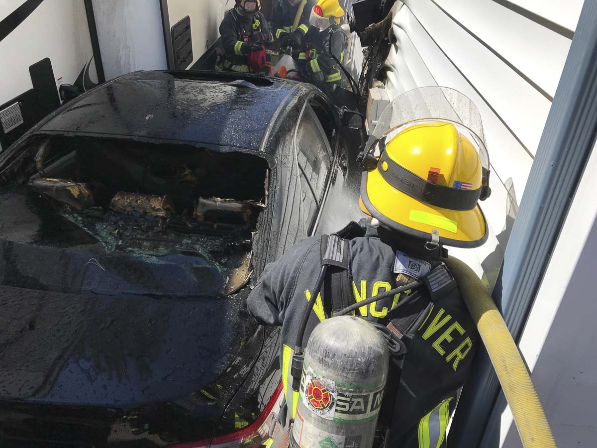 The first two arriving engine companies worked quickly to contain the fire to the involved vehicle and outside wall of the two-story, single-family residence. Photo courtesy of Vancouver Fire Department