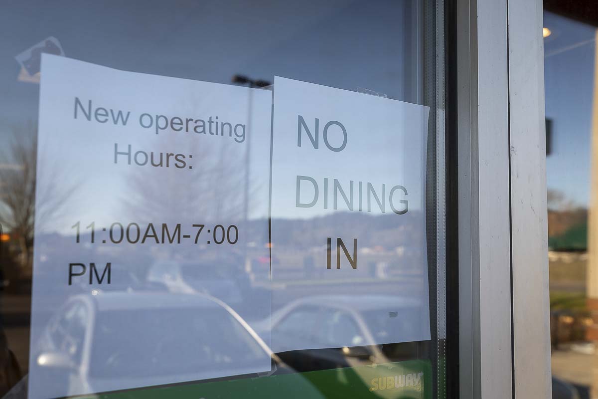 A sign in a Woodland Subway window last March informed customers that the dine-in area was closed. Photo by Mike Schultz