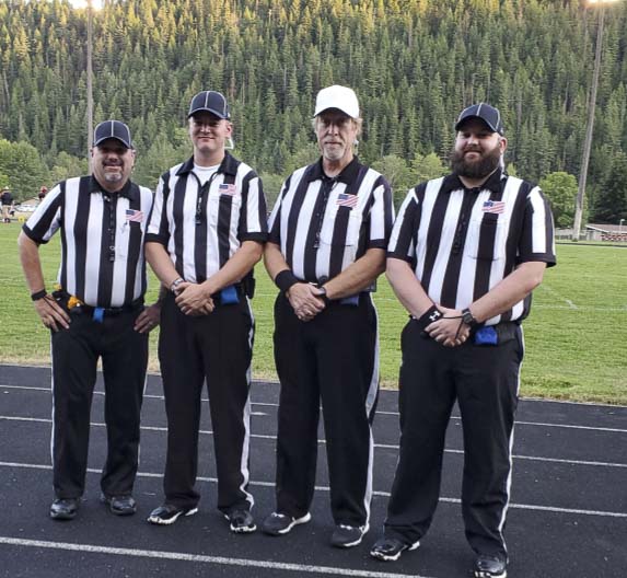 Todd Bingham (white hat) met his crew for the first time about an hour before the game. Bingham, a longtime high school football official from Vancouver, found a game to work in Idaho last week. Photo courtesy of Todd Bingham