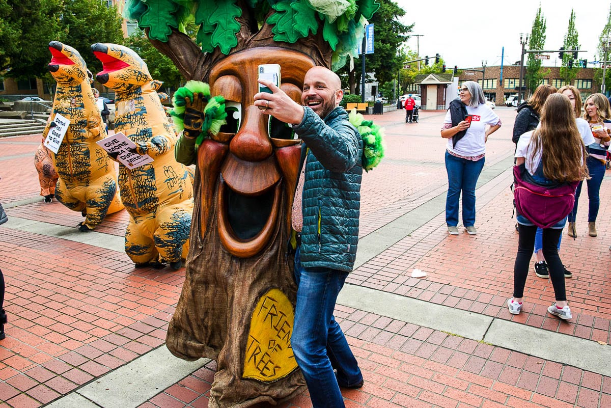 Vancouver council member Ty Stober poses with a Friends’ of Trees mascot Garry Oak at 2019’s Give More 24! in Esther Short Park. Photo courtesy of the Community Foundation for Southwest Washington