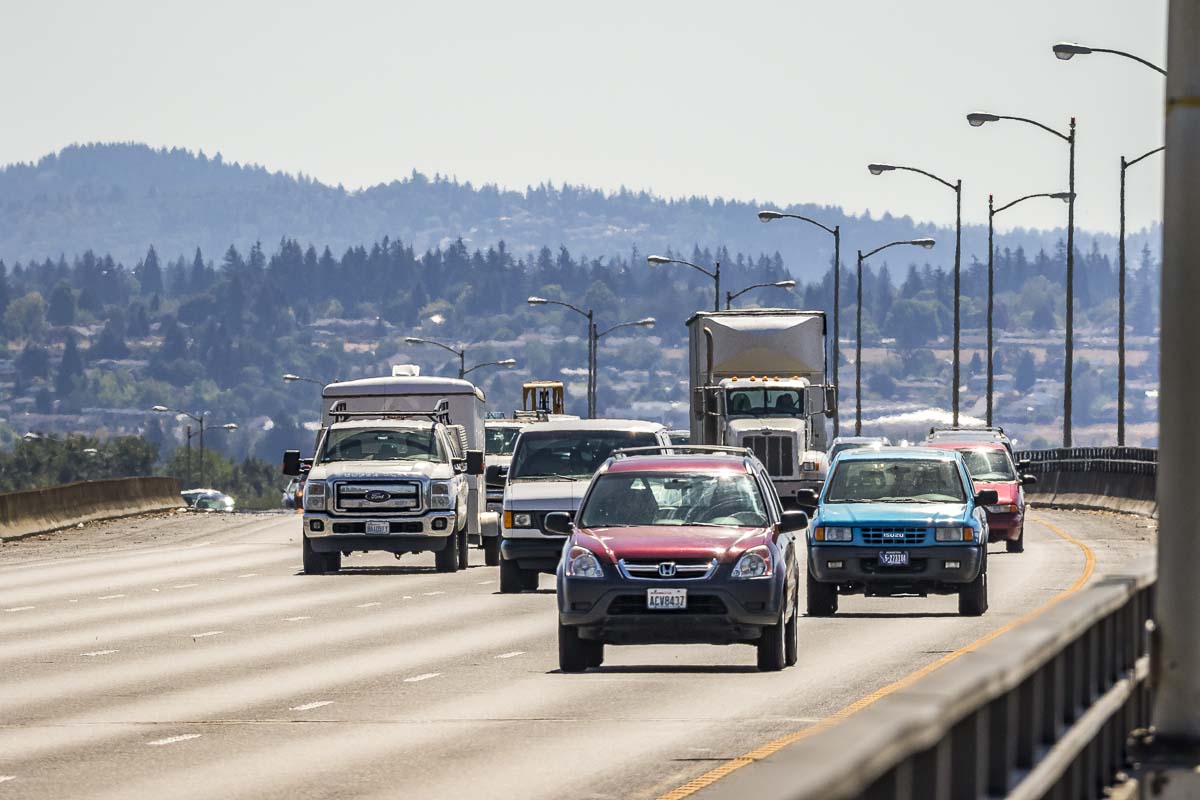 Drivers are shown here crossing the I-205 Bridge, traveling from Oregon into Washington. More than 70,000 Clark County residents commute to Oregon for work each week. Photo by Mike Schultz